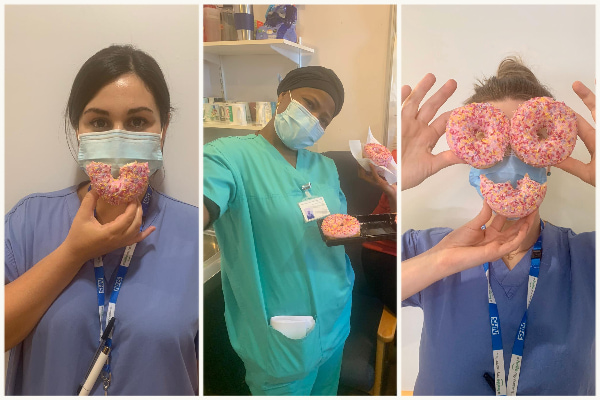 Nurses taking selfies with doughnuts